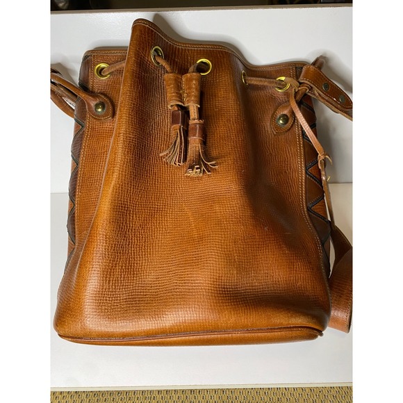 Dooney & Bourke Handbags - VTG Dooney & Bourke Drawstring Bucket Bag Leather Shoulder Bag Brown Tassels
